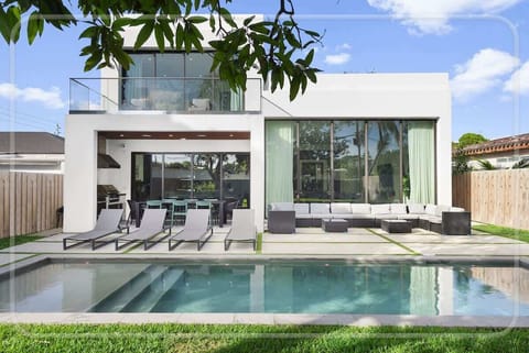 Take a refreshing swim in your private pool framed by sleek architecture. The perfect spot to relax in style and soak up the sun.