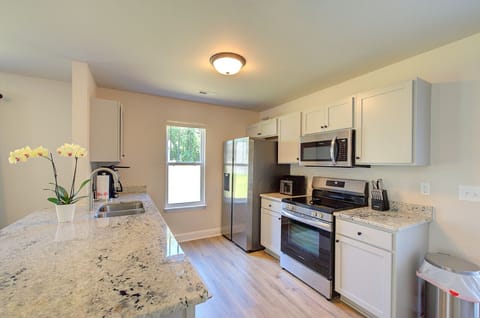 Granite kitchen countertops and stainless appliances and f