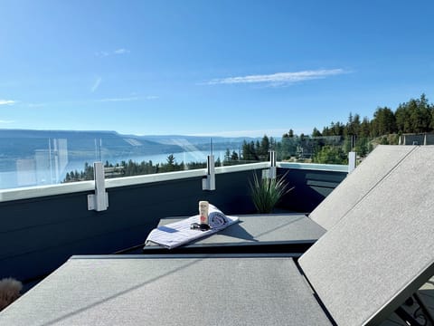 Exclusive Upper Deck with Lounge Chairs and Lake Views