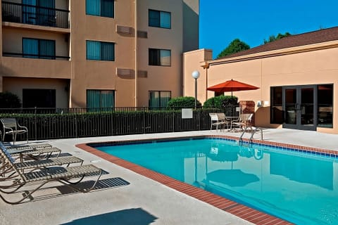 Dive into sunshine and unwind beside the sparkling outdoor pool.