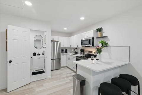 “Bright, Fully Stocked Kitchen”