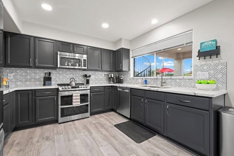 Whip up vacation meals with ease in this fully stocked kitchen with updated appliances.