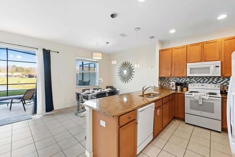 Dining room with view to the pool and living room