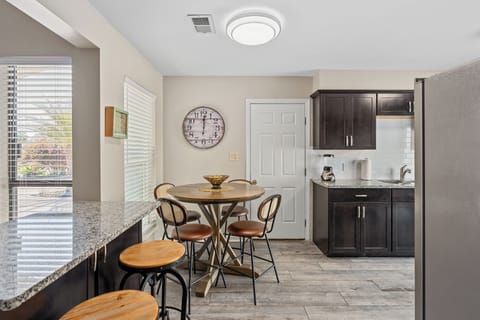 Bright and airy kitchen with an adjacent breakfast nook.