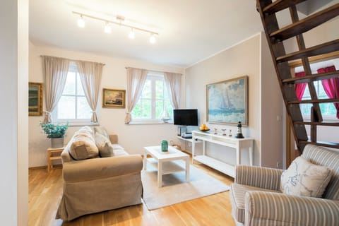 Bright Living Room with Sofa and TV