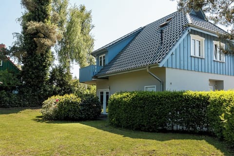 Exterior View of a House with Green Garden