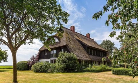 Thatched House in Beautiful Garden