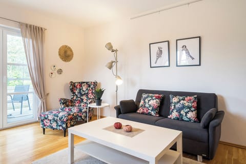 Living Room with Sofa and Armchair