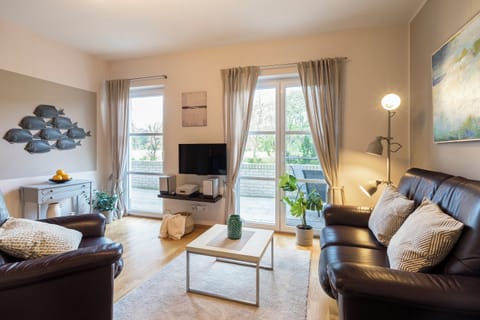 Cozy Living Room with Access to the Terrace