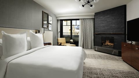 King Room offers gas fireplace, living area, separate soaking tub, mini-bar, desk, daily housekeeping, and more