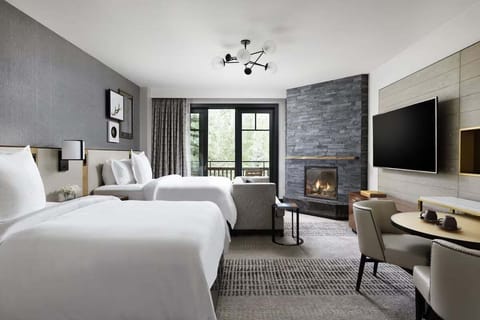 Two Double Room offers 2 Beds, Fireplace, Mini Bar, Separate Soaking Tub