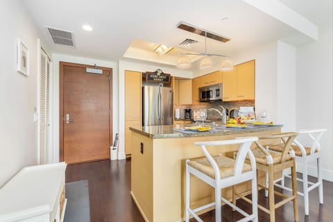 Gather around the kitchen island—perfect for casual meals