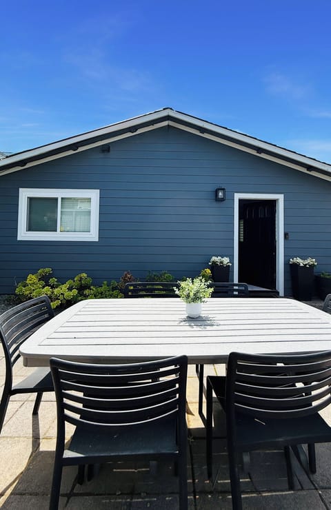 Outdoor dining area with gas grill
