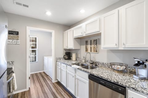 Whip up a delicious meal in the fully equipped kitchen - the heart of your cozy condo that's sure to inspire your inner chef!