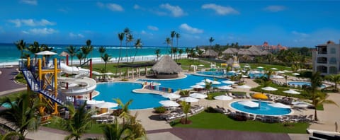 Escape to a beachfront pool paradise with endless ocean views.