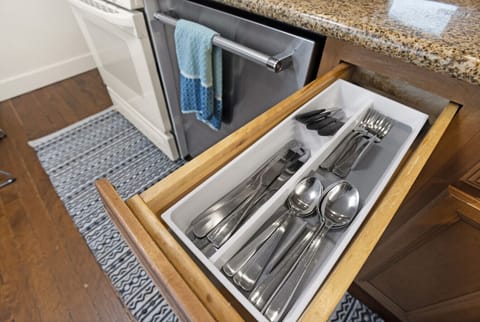 No need to pack utensils—this drawer has everything you need for your meals and morning coffee.