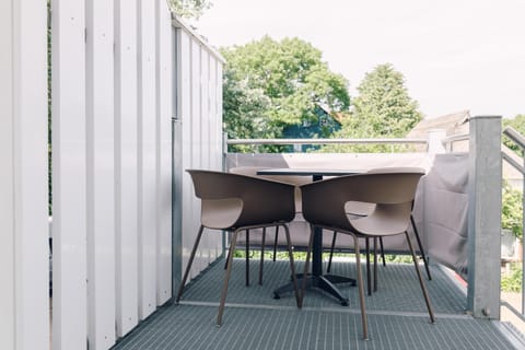 Modern Terrace with Table and Chairs