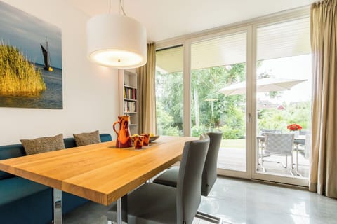 Bright Dining Room with Garden View
