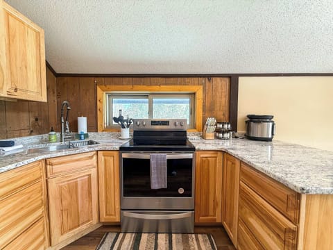 The electric range and ample counterspace is perfect for preparing meals for your whole group