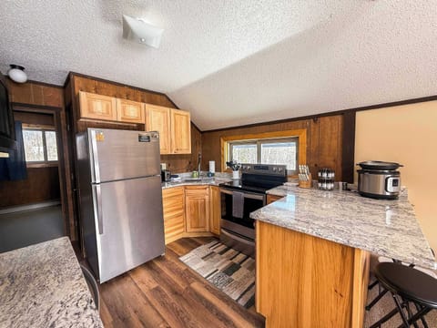 Our full kitchen also features a breakfast bar