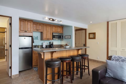 The inviting open kitchen offers ample space & all the comforts of home