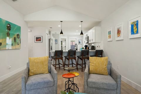 Open-concept flow so everyone stays part of the convo—whether you’re on the couch or on snack duty