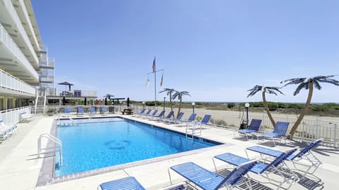 The pool deck with view of the beach