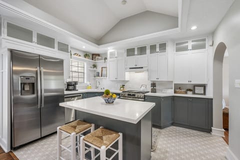 Fully stocked kitchen with island and gas range