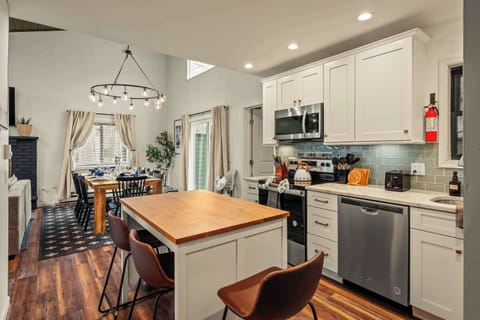 A stylish, open kitchen and dining space perfect for family meals and conversations.