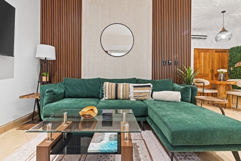 The condo's chic decor is inspired by the jungles of Costa Rica - a rich blend of natural elements that create an inviting space for your vacation.