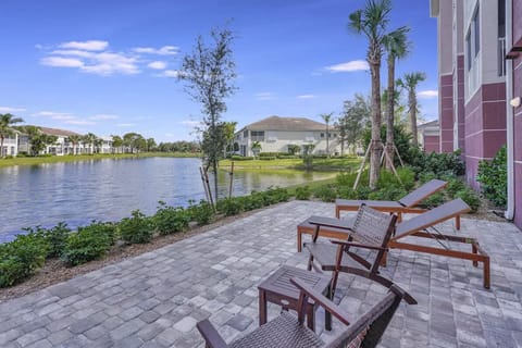 From the gym you can step out to a patio overlooking the pond