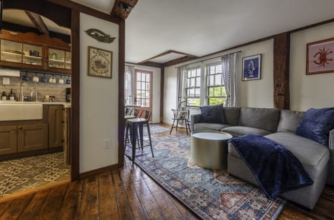 Living room and galley style kitchen