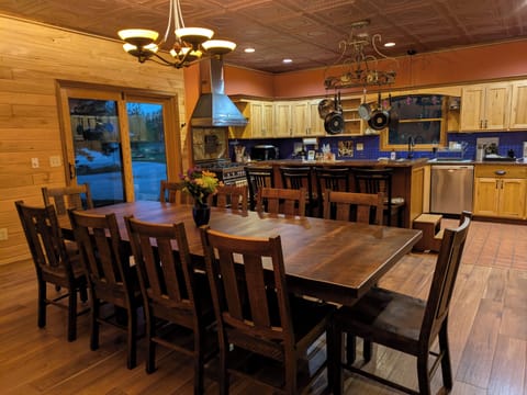 Large dining room table that has two additional leaves to get even bigger.