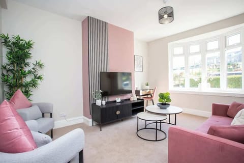 Filled with natural light, the living area creates a warm and relaxing vibe. Whether you're reading a book or enjoying a family movie night, this room has you covered.