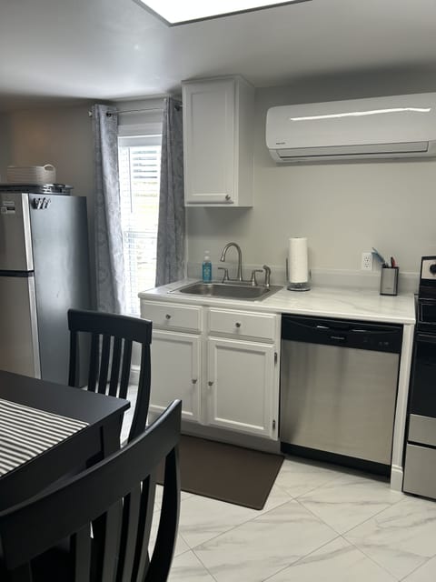 Eat in kitchen with full size appliances and also full size washer/dryer