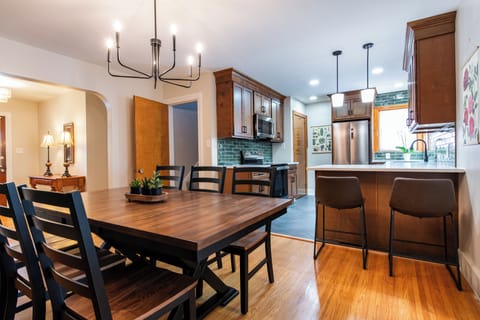 Open-concept dining and a fully stocked chef's kitchen