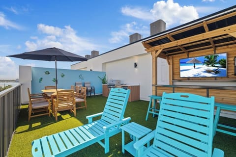 Private rooftop with enough seating to fit everyone you brought (updated with games like ring toss)