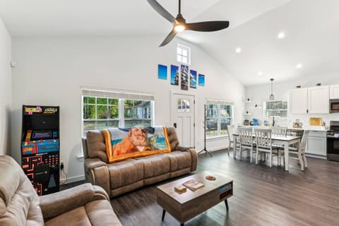 Full-size arcade game.  Coffee table lifts up and has games inside