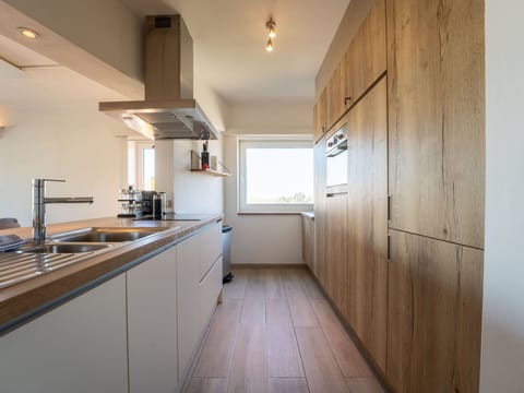 Countertop, Kitchen, Interior Design, Flooring, Wood, Cabinetry, Ceiling, Kitchen Appliance, Furniture, Floor