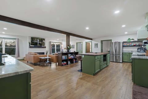 Walk inside to the stunning open floor plan. 