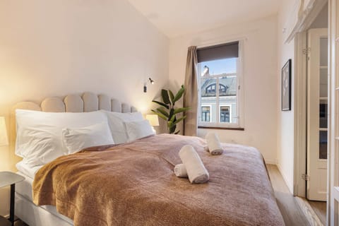 A peaceful space with soft bedding and a calming ambiance.