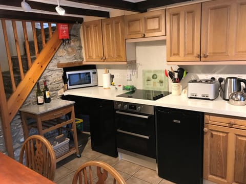 View of the kitchen in The Cottage holiday cottage in, Padstow, North Cornwall