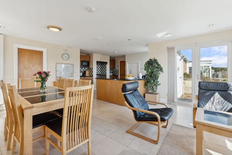 Dining area and kitchen of Pendennis Holiday Cottage, Padstow, North Cornwall
