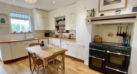 View of kitchen and oven at Treaaron Holiday Cottage, St Merryn, North Cornwall