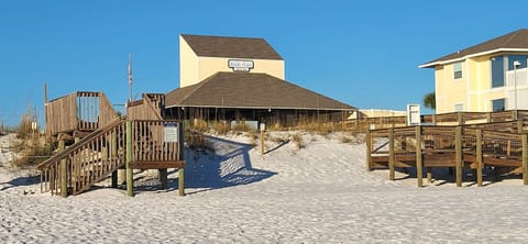 Ramp-accessible dune walkover from the beachside bar to the Gulf shoreline.