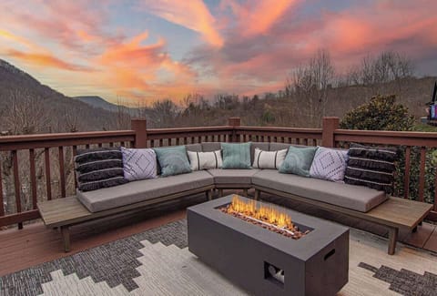Light up the fire pit as the sun goes down on the Smokies!