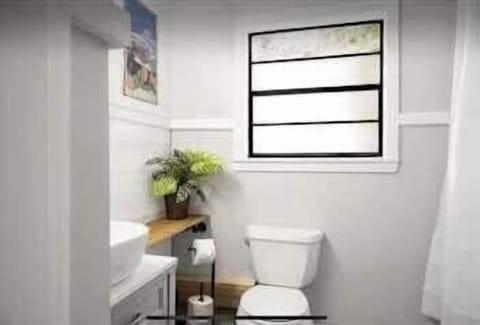 A clean and bright bathroom with contemporary fixtures and a refreshing atmosphere.