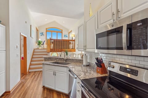 Whip up a delicious meal in the Kitchen with modern appliances.