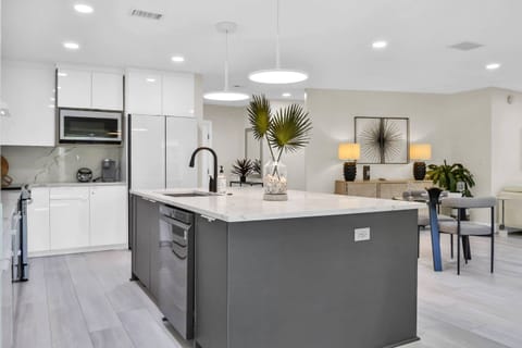 Large island with high end appliances & great counter space to make meal prep effortless!