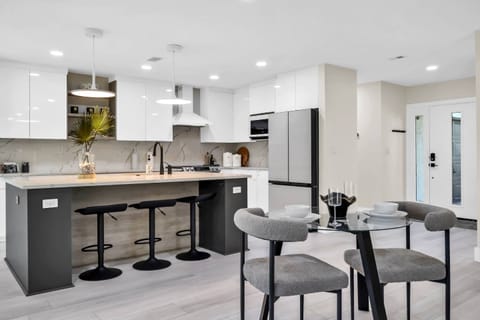 Host-worthy kitchen with cozy seating at the island or private table!